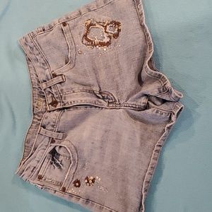 L.A. Blues Denim Shorts Blue with brown/white stitching. Size 8.